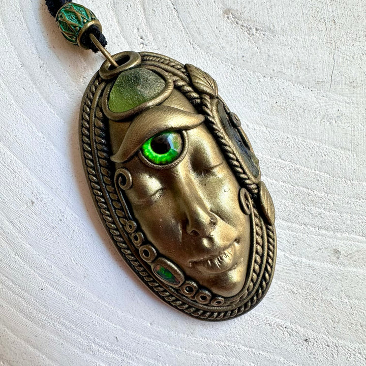 Handmade spiritual jewelry with Peridot, Moldavite and Ethiopian Opal in a Goddess-inspired setting.
