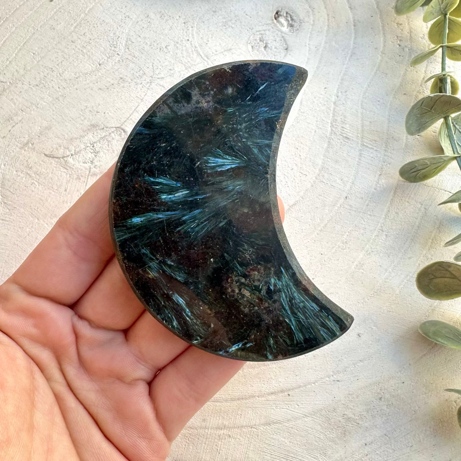 Astrophyllite moon shaped mineral specimen