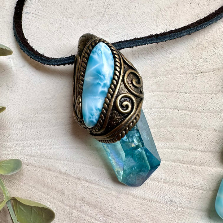 Aura quartz paired with larimar in a pendant necklace