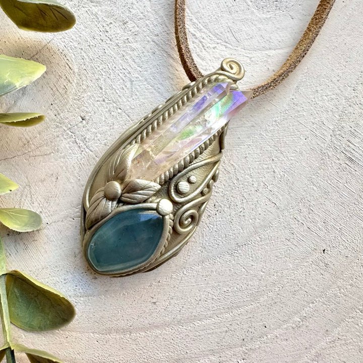 Aura quartz paired with celestite in a necklace