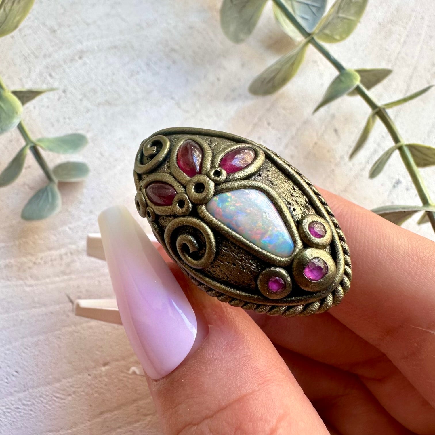 Handmade ring featuring Australian Opal, Rhodolite Garnet and Ruby natural gemstones.
