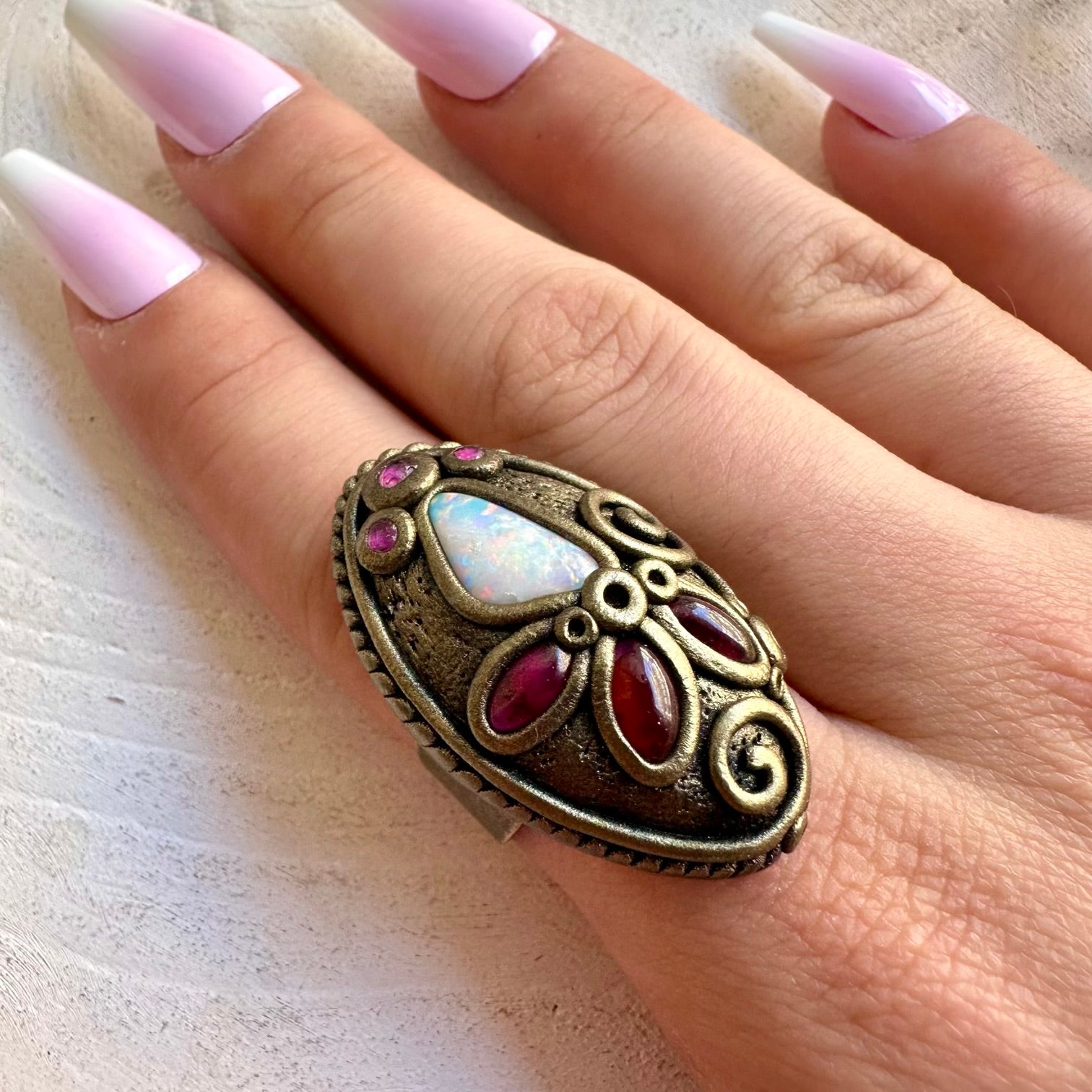 Colorful gemstone jewelry combining Australian Opal with Rhodolite Garnet and Ruby.