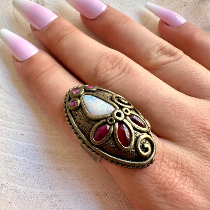 Colorful gemstone jewelry combining Australian Opal with Rhodolite Garnet and Ruby.