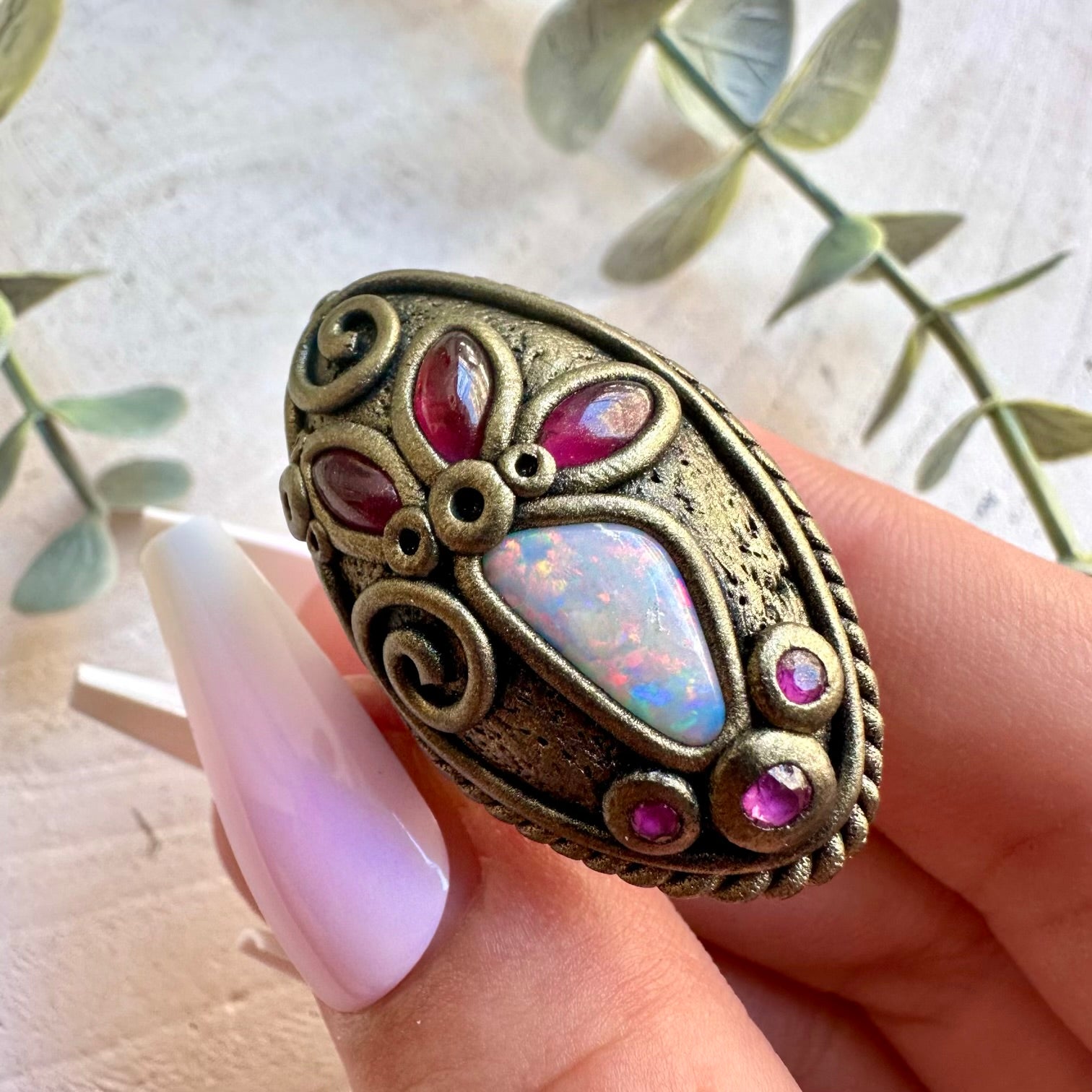 Handmade statement ring featuring Australian Opal, Rhodolite Garnet and Ruby gemstones.
