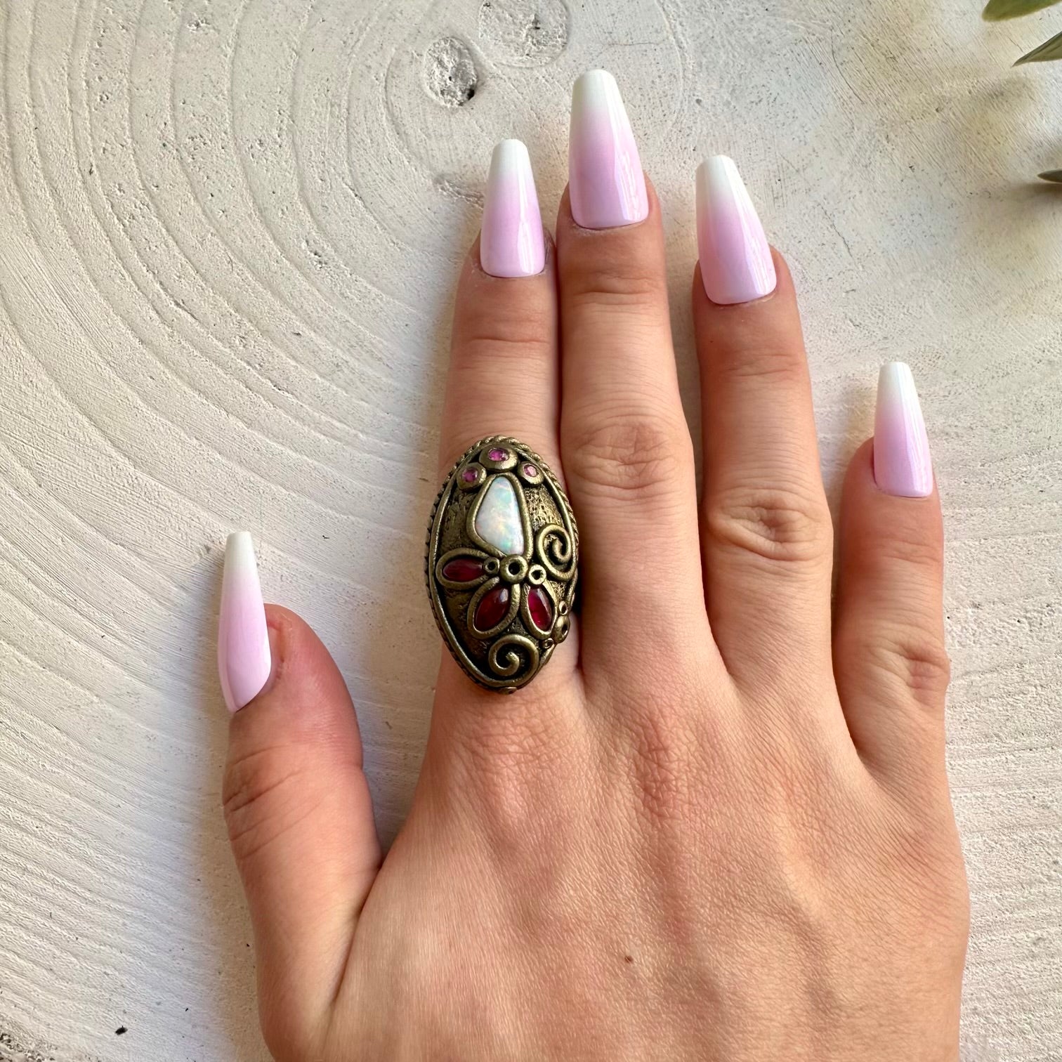 Artisan ring featuring Australian Opal with rich red Rhodolite Garnet and Ruby gemstones.
