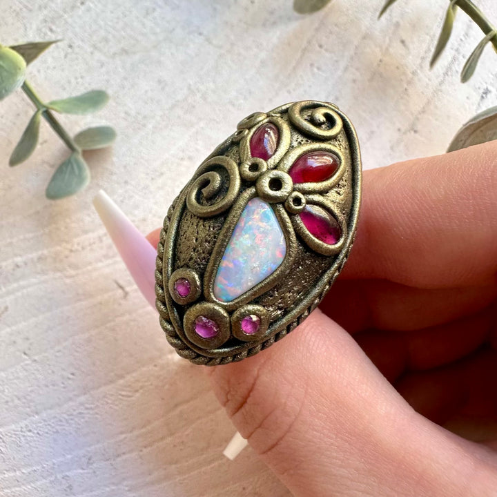 Unique Australian Opal jewelry handcrafted with Rhodolite Garnet and Ruby.
