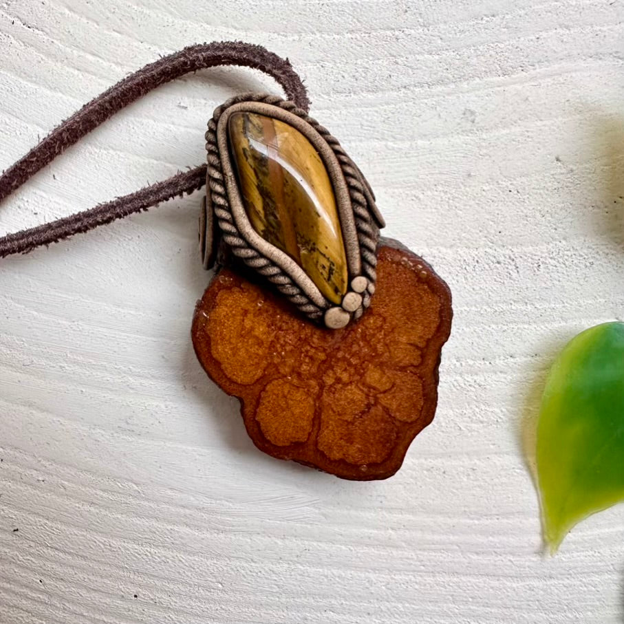 Healing crystal pendant made with Tiger’s Eye and Ayahuasca Vine