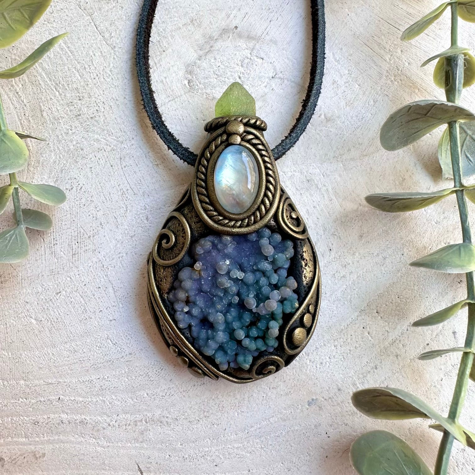 Handmade crystal jewelry showcasing purple Chalcedony with colorful natural gemstone details.