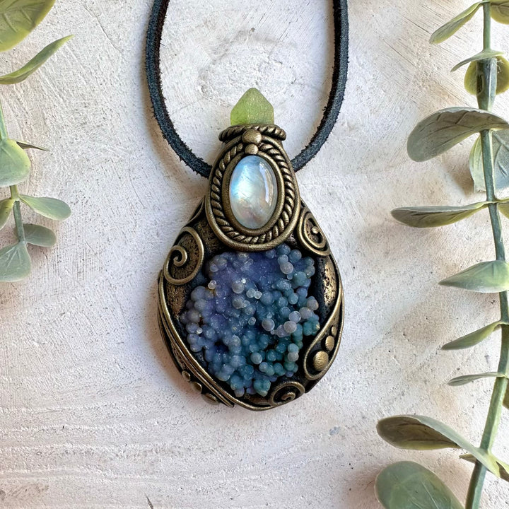 Handmade crystal jewelry showcasing purple Chalcedony with colorful natural gemstone details.
