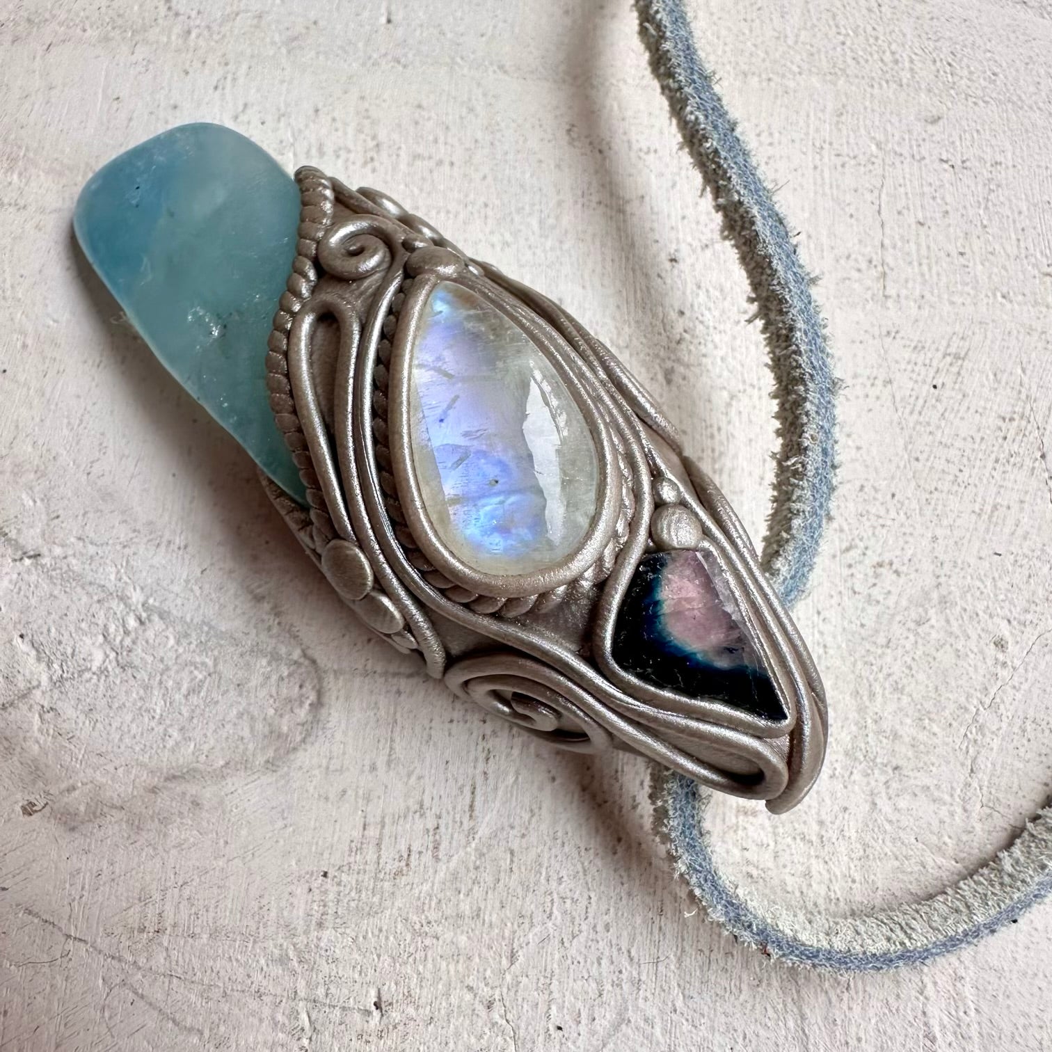 Spiritual jewelry combining aquamarine moonstone and tourmaline