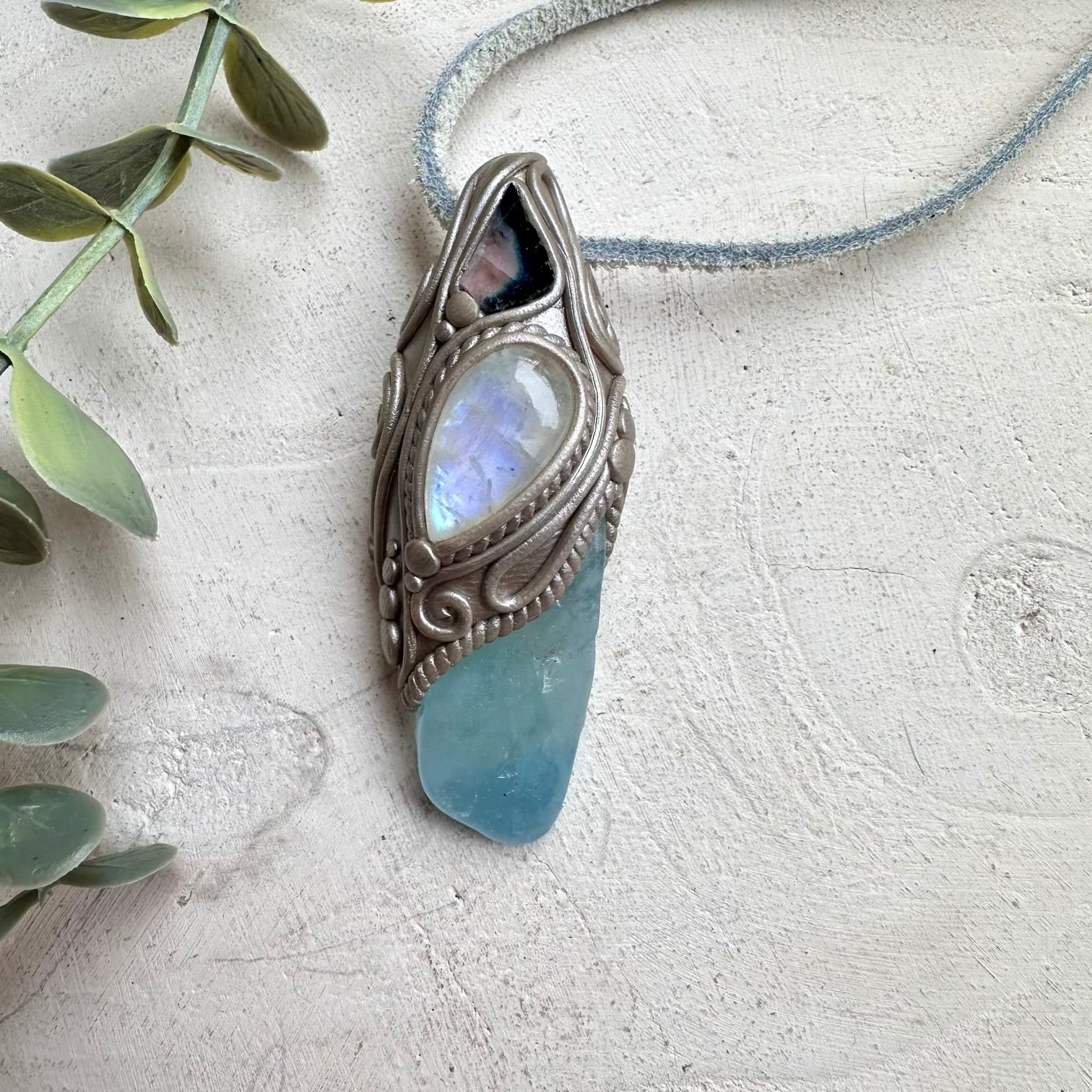 Healing crystal pendant with aquamarine and bi color tourmaline