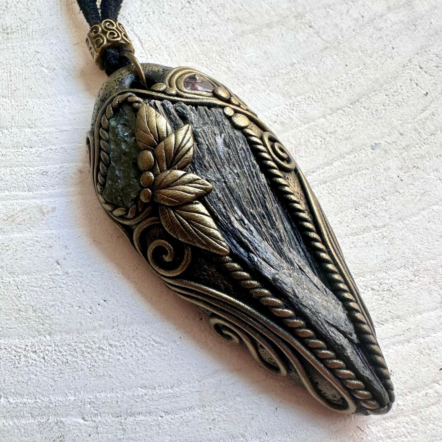 Handmade healing crystal necklace with Black Kyanite and natural Moldavite and Garnet accents.