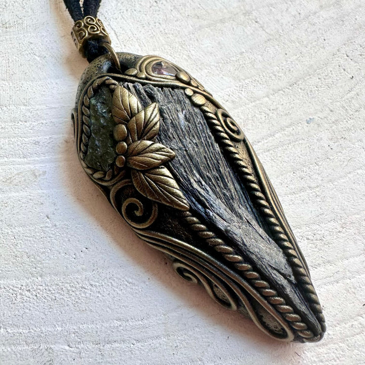 Handmade healing crystal necklace with Black Kyanite and natural Moldavite and Garnet accents.