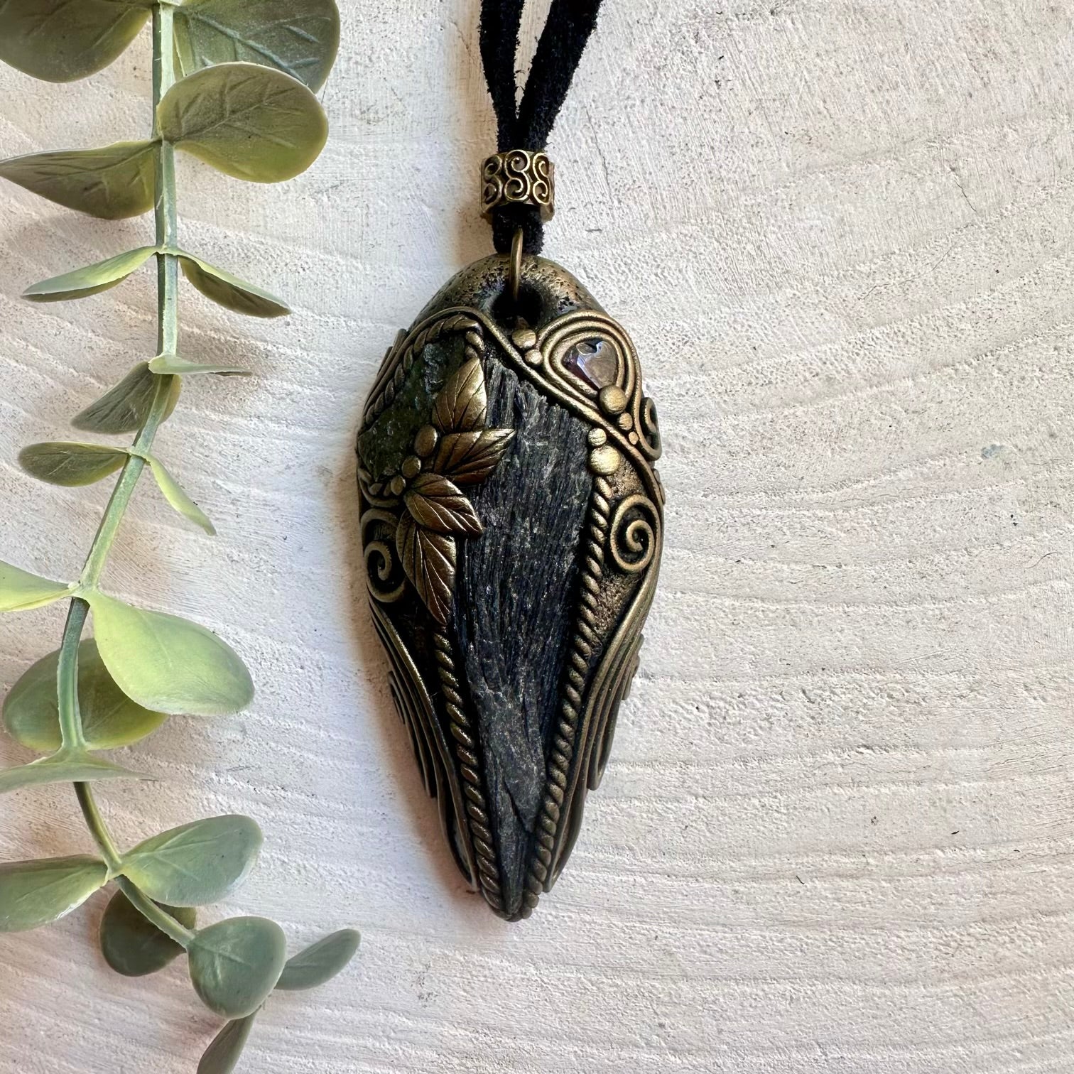 One of a kind crystal necklace featuring Black Kyanite, Moldavite and genuine Red Garnet.