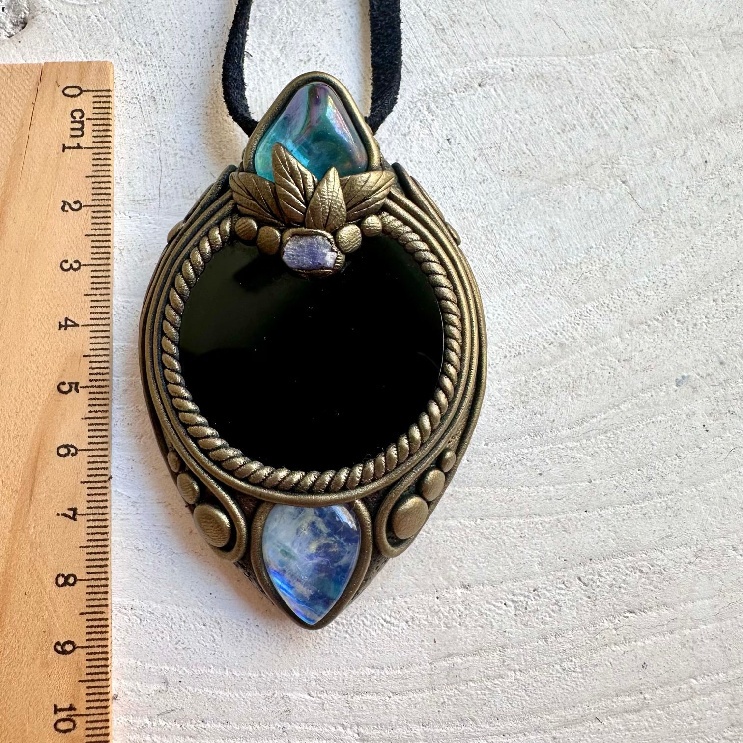 Handmade Black Obsidian Mirror pendant necklace with Aqua Aura Quartz, Rainbow Moonstone and Raw Tanzanite.