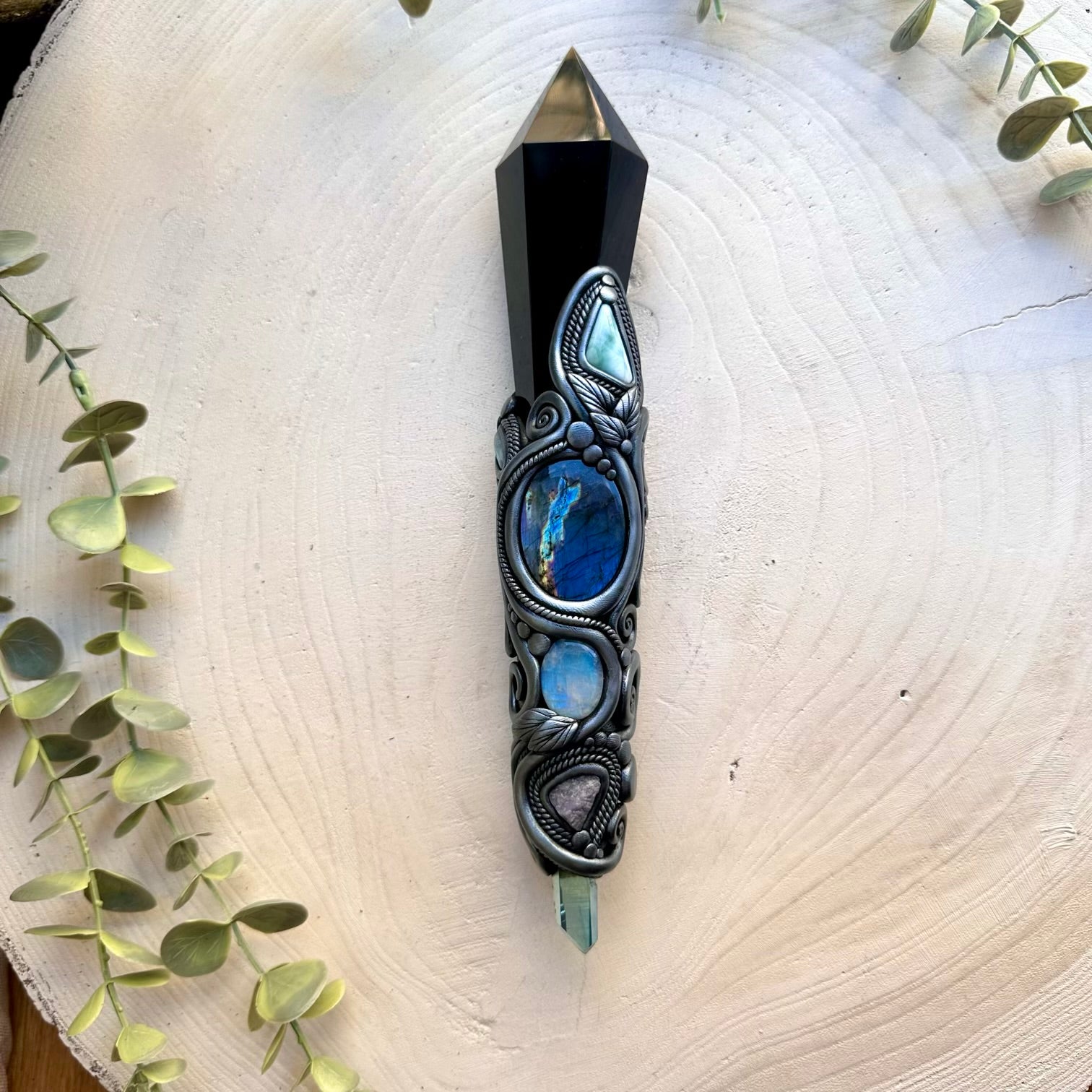 Handmade crystal wand featuring black obsidian rainbow moonstone and tanzanite