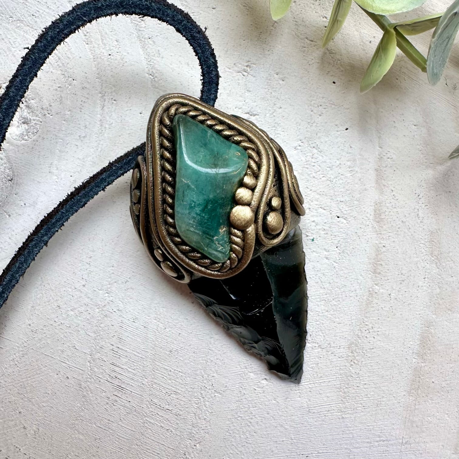 Healing crystal pendant with black obsidian and emerald