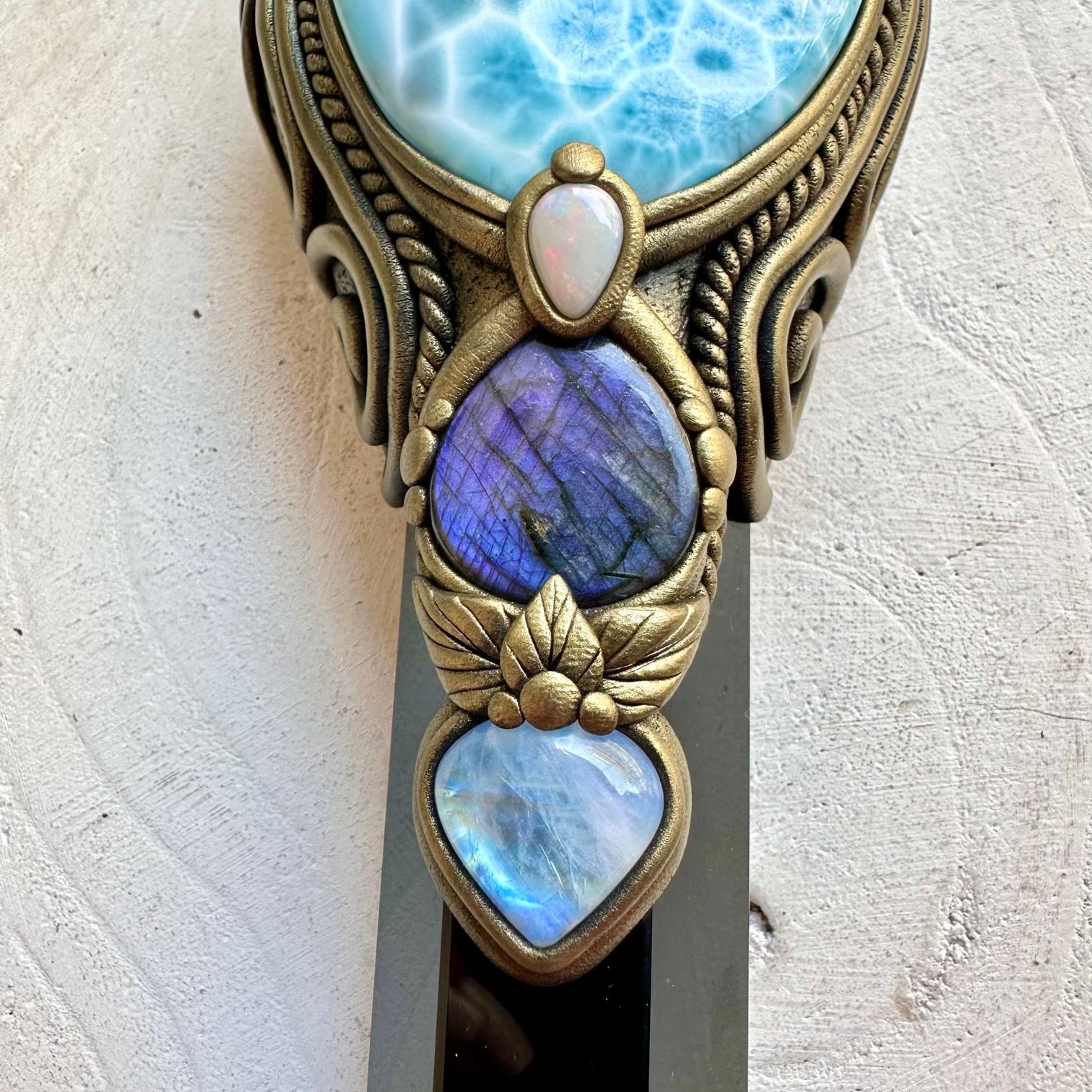 Witchcraft crystal wand featuring a beautiful large Larimar with Amethyst and Australian Opal accents.
