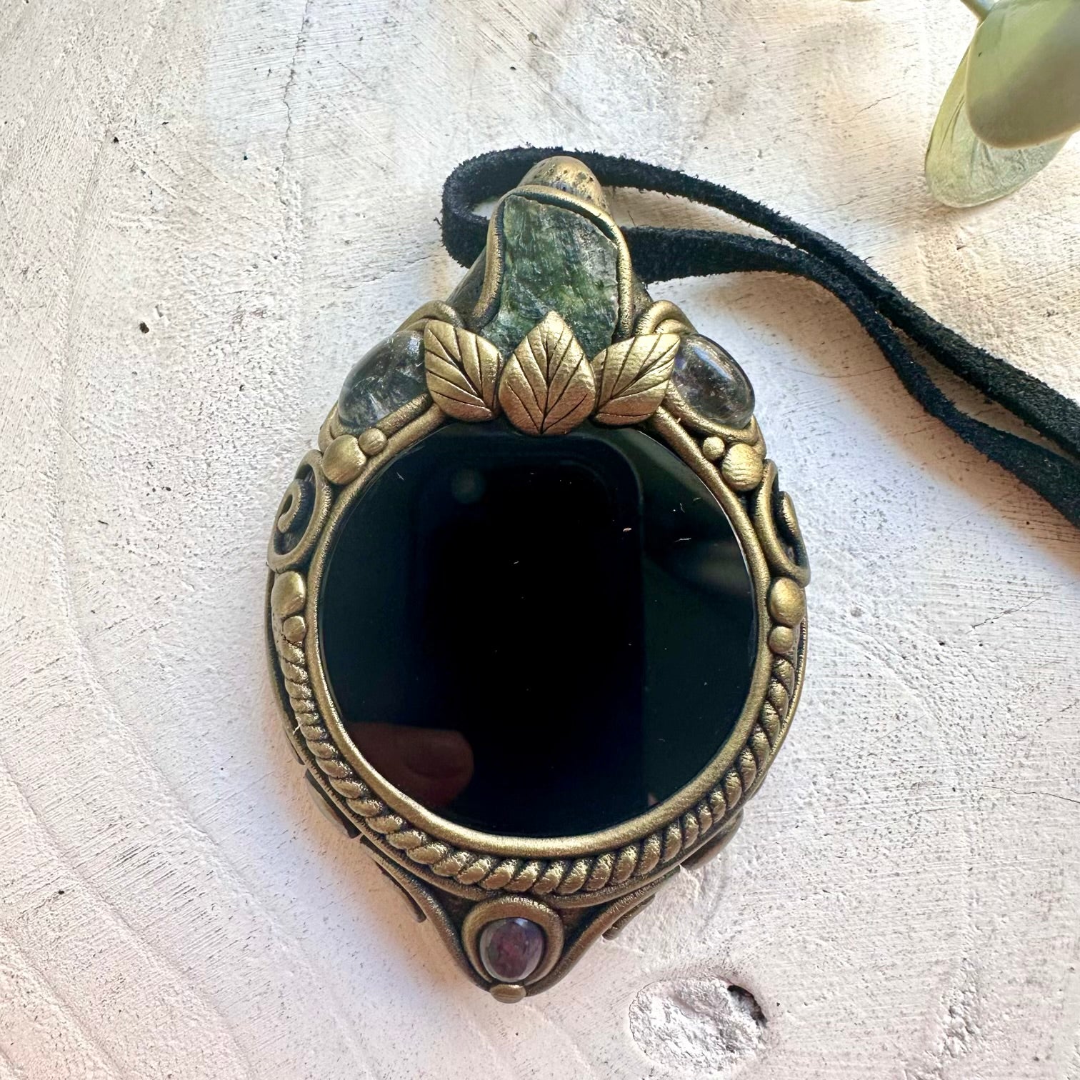 Handmade mystical crystal necklace featuring a Black Obsidian Mirror with Moldavite, Clear Topaz and Black Ethiopian Opal, a unique protection talisman designed for grounding, transformation, intuition and spiritual growth.