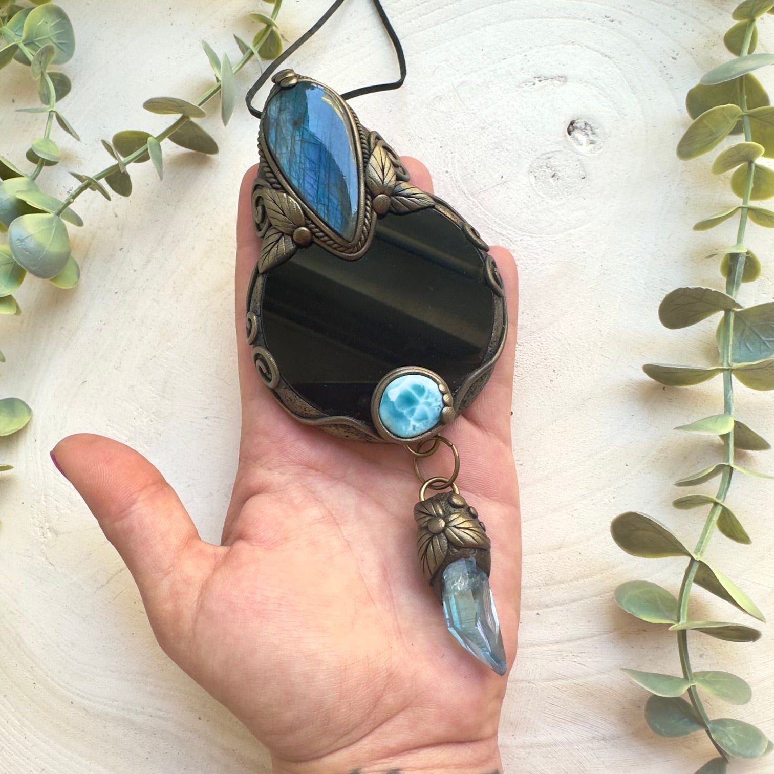 Handmade Black Obsidian mirror wall art decorated with natural crystals