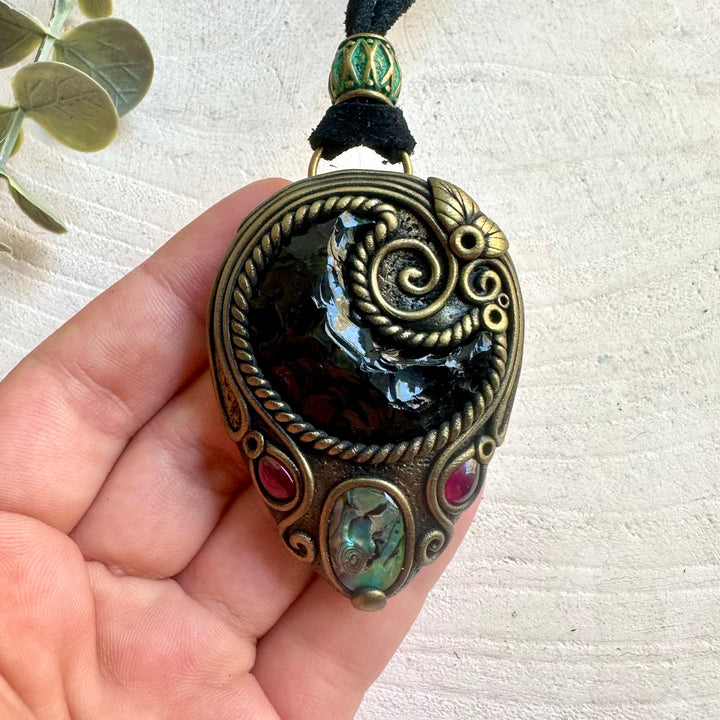 Handmade Black Obsidian Moon pendant necklace with Abalone Seashell and Rhodolite Garnet natural gemstones.