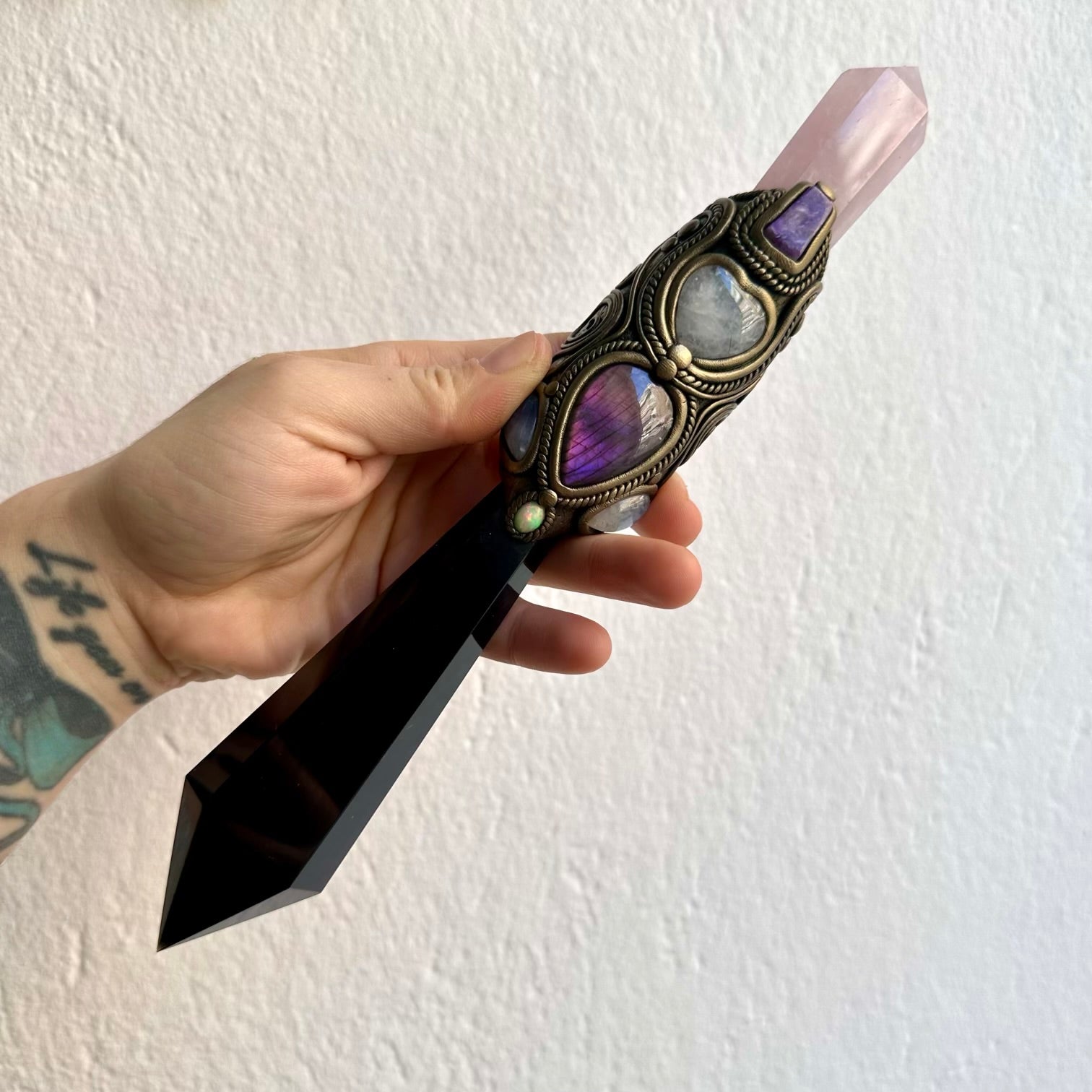 Healing crystal wand featuring black obsidian rose quartz and charoite