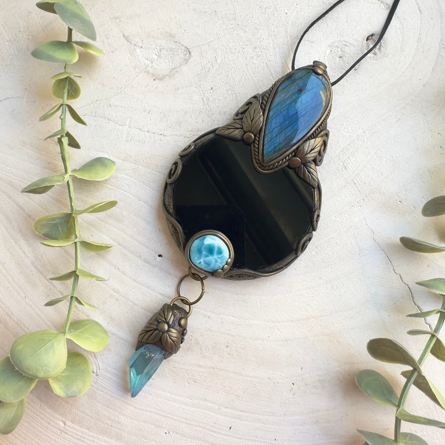 Black Obsidian scrying mirror wall hanging with Labradorite, Larimar and Aqua Aura Quartz