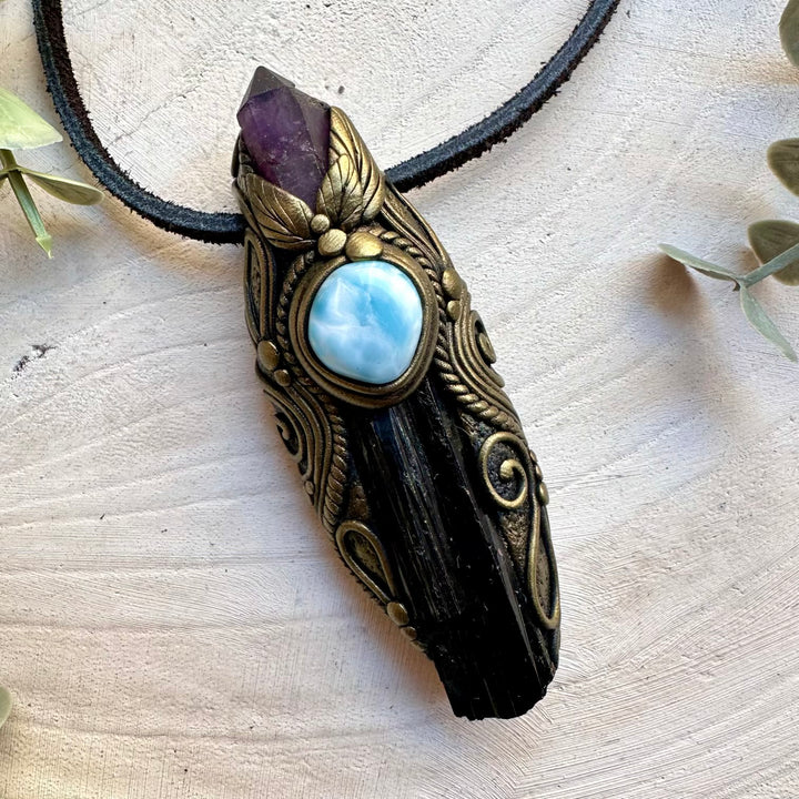Black tourmaline paired with amethyst point and larimar