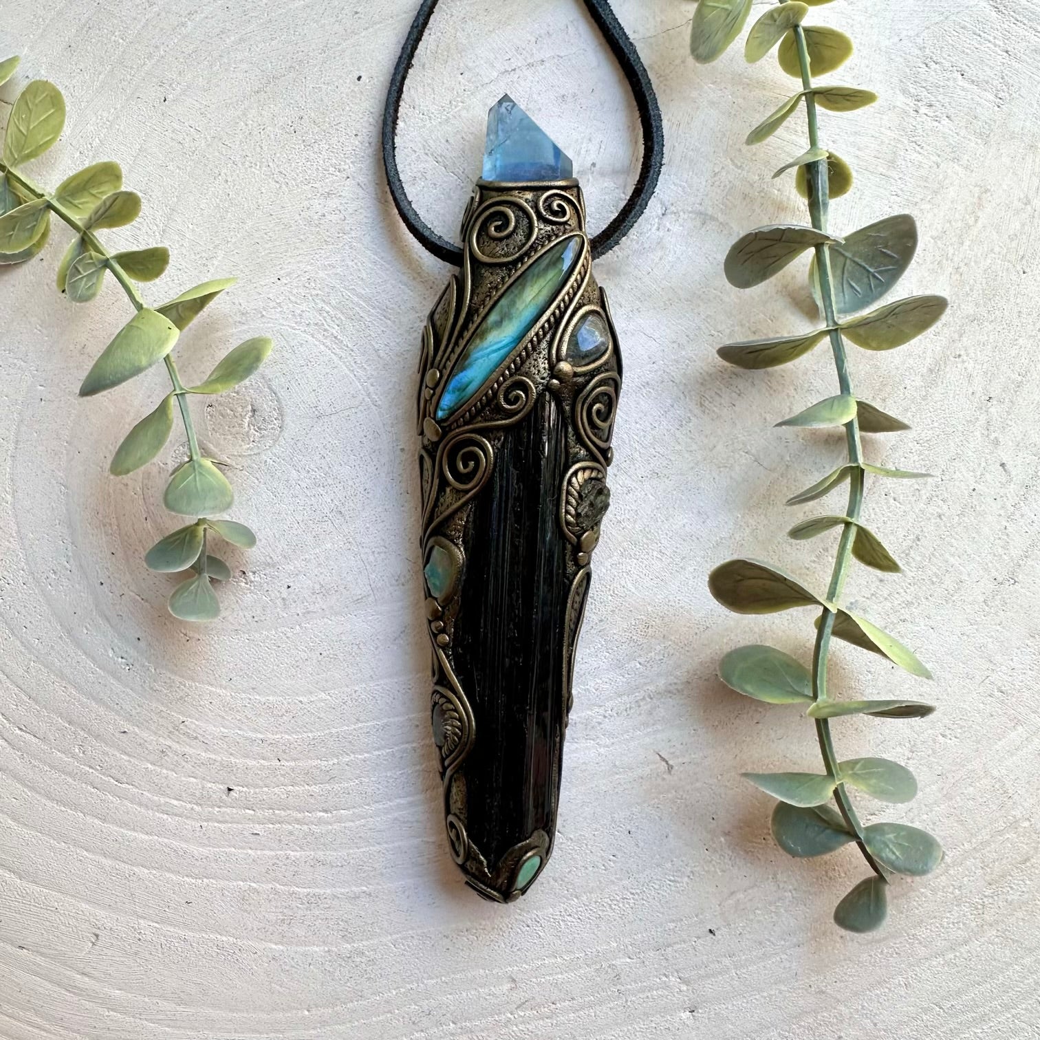 Unique healing crystal wand featuring natural Black Tourmaline with shimmering Labradorite and blue Aqua Aura Quartz.