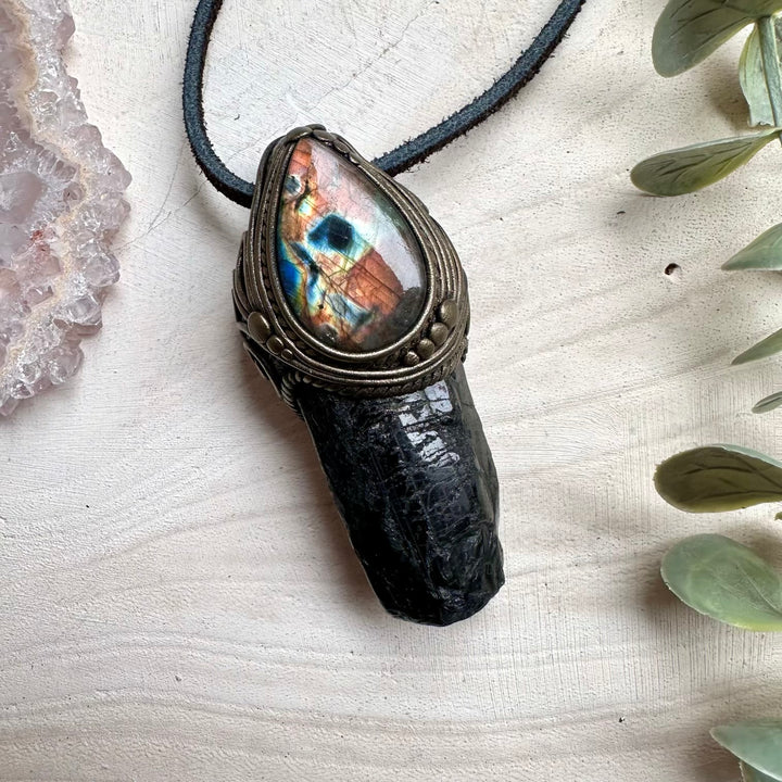Black tourmaline paired with labradorite in a necklace