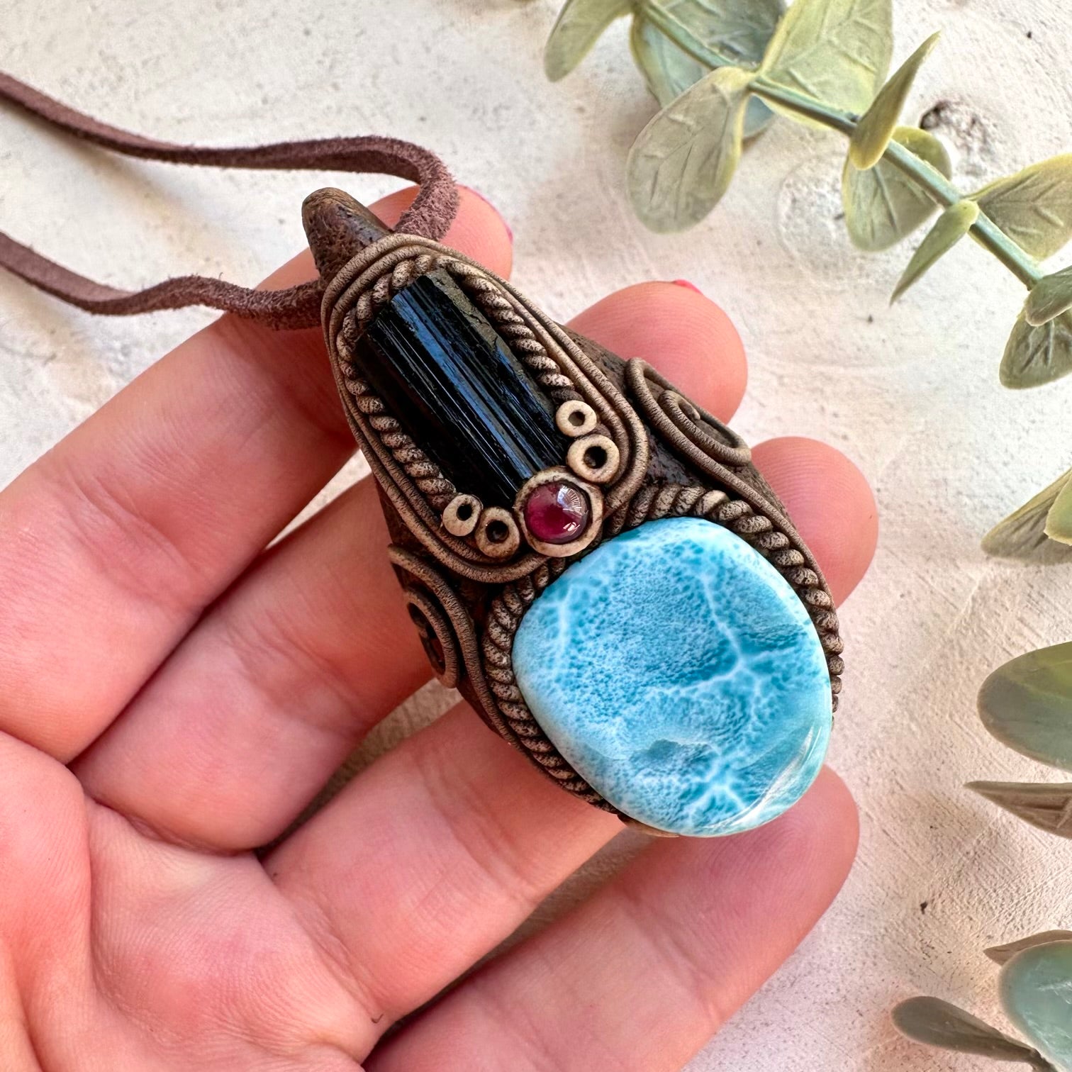 Metaphysical jewelry featuring ocean and grounding crystals