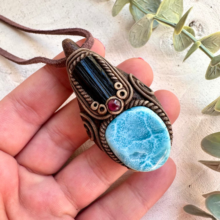 Metaphysical jewelry featuring ocean and grounding crystals