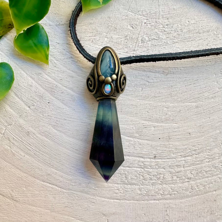 Fluorite crystal pendant paired with Aquamarine and Australian Opal