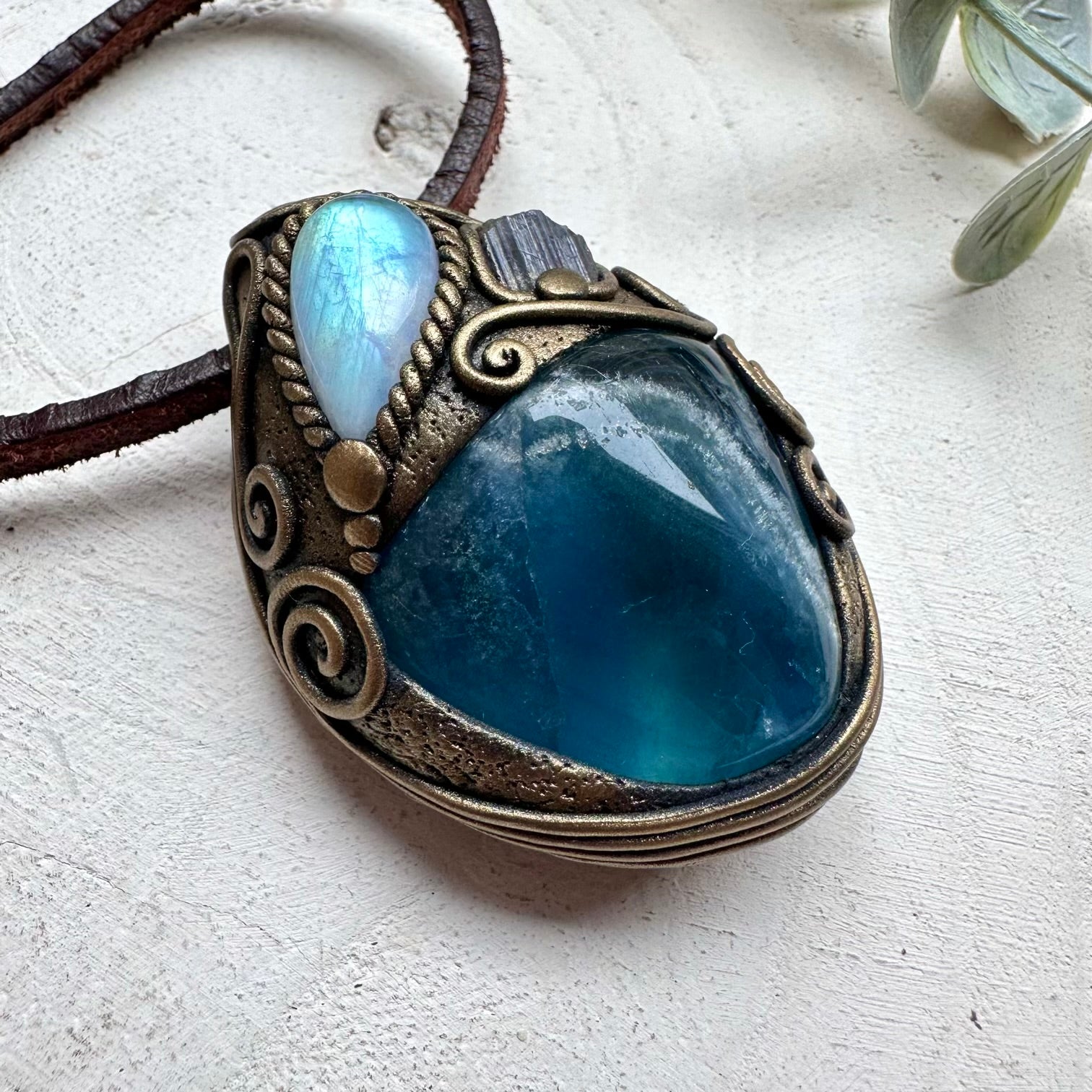 Healing crystal pendant with fluorite moonstone and tanzanite