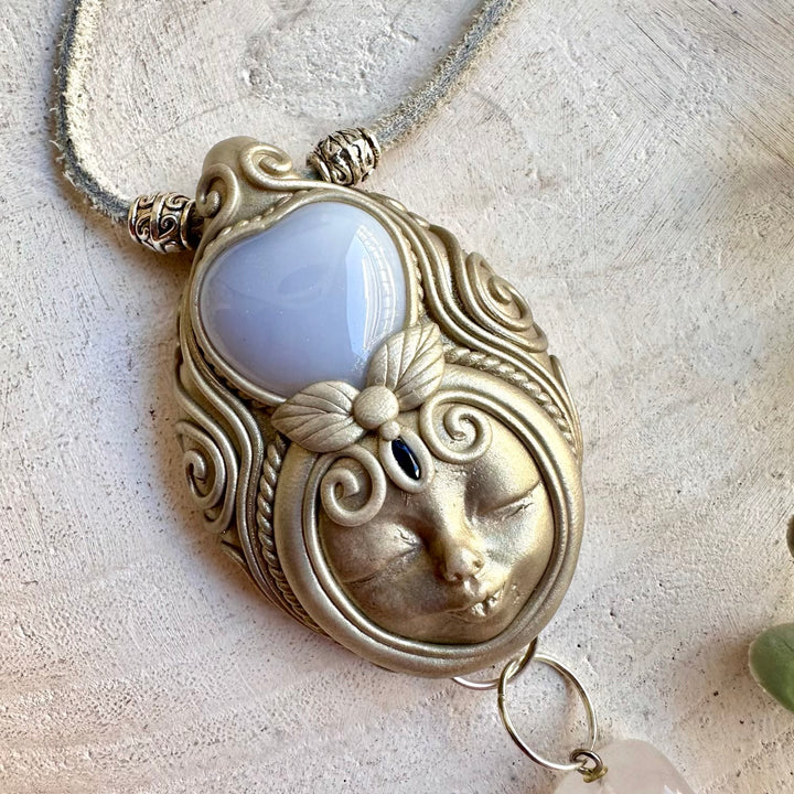 Spiritual Goddess necklace handcrafted with Blue Chalcedony, Clear Quartz and Blue Sapphire.