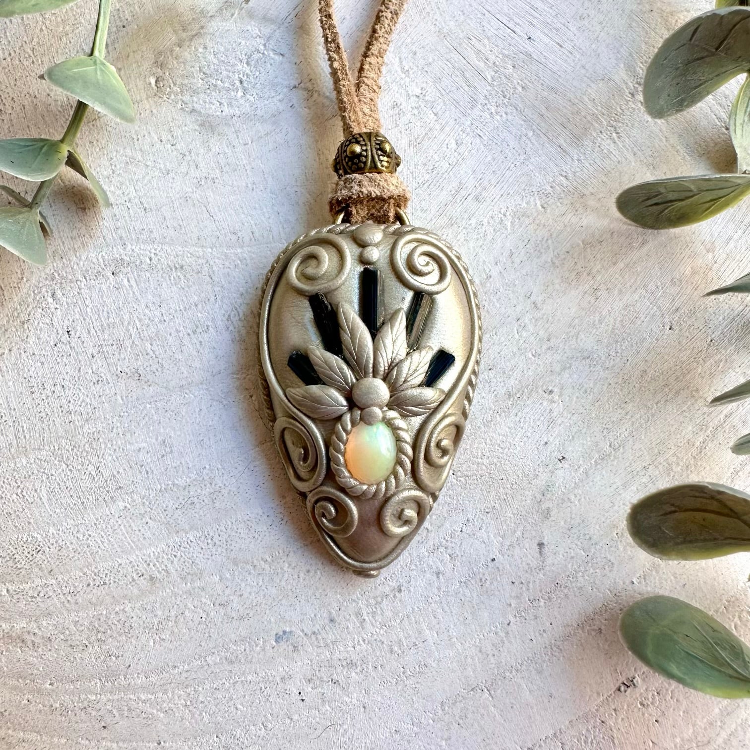 Natural gemstone pendant handcrafted with Blue Tourmaline and colorful Ethiopian Opal.