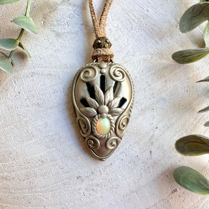 Natural gemstone pendant handcrafted with Blue Tourmaline and colorful Ethiopian Opal.