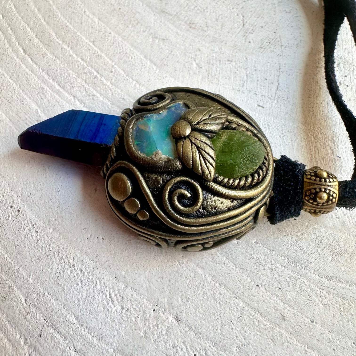 Unisex crystal pendant necklace made with Cobalt Aura Quartz, Peridot and genuine natural stones.
