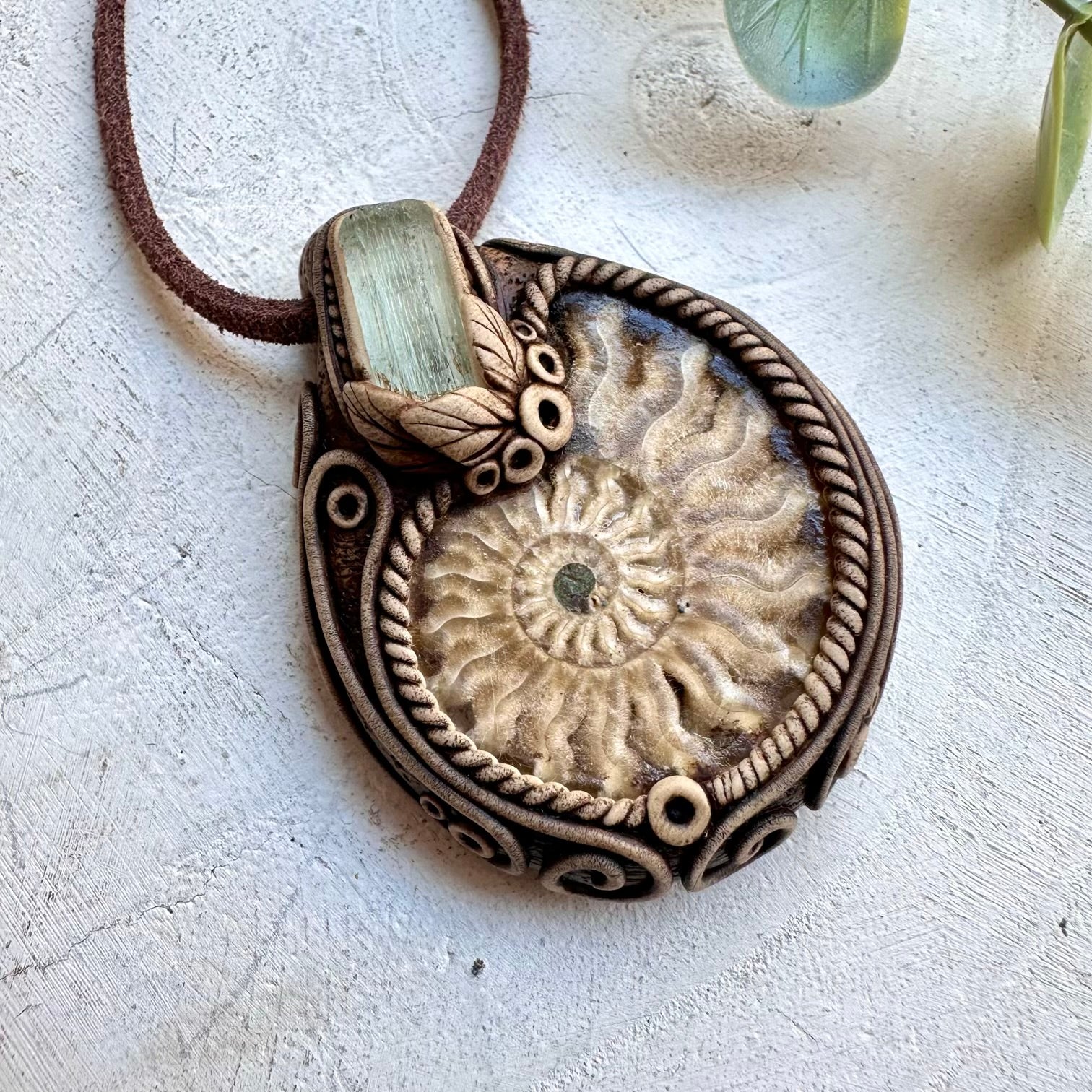 Healing crystal pendant with ammonite and aquamarine