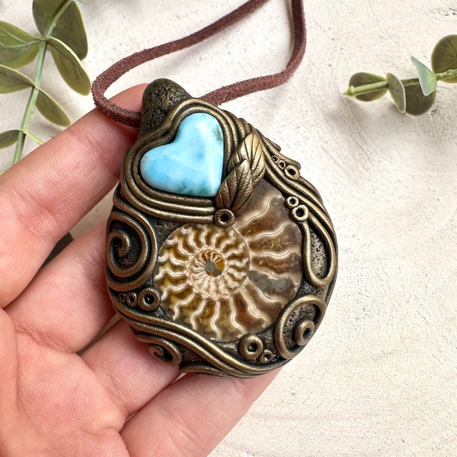 Boho healing crystal heart necklace with larimar gemstone and ammonite fossil centerpiece