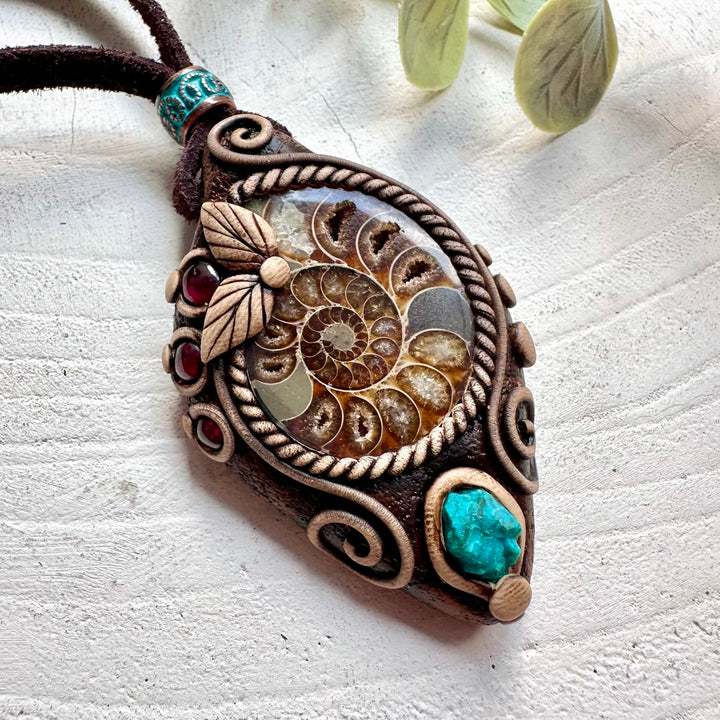 Spiritual crystal necklace featuring Chrysocolla and Garnet for emotional balance and positive energy