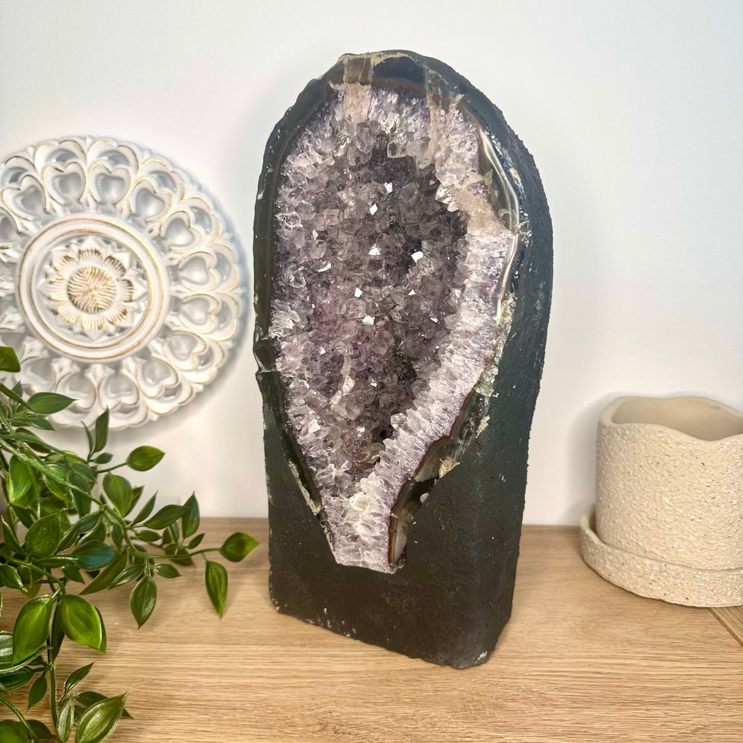 Large purple amethyst crystal cluster for interior decoration