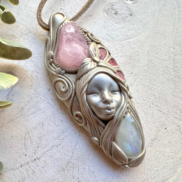 Morganite paired with pink tourmaline and moonstone in a necklace