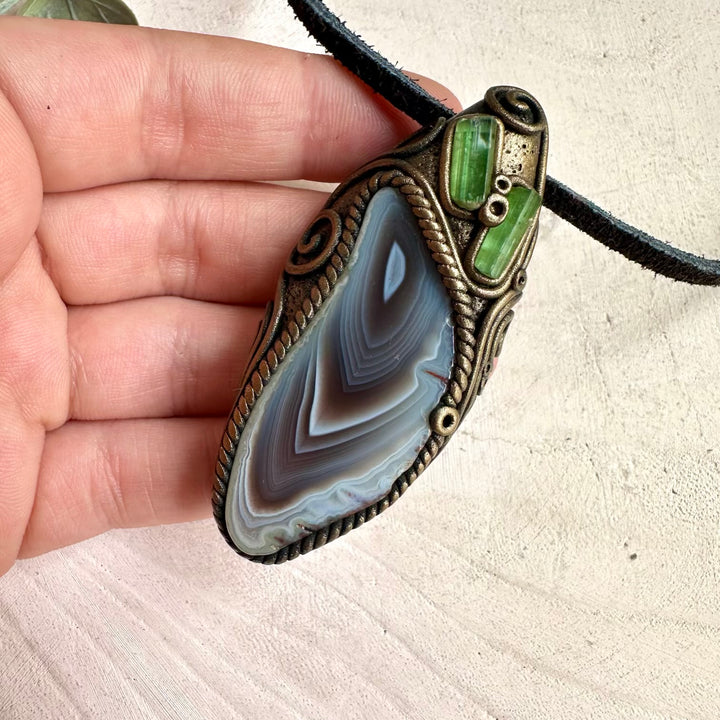 Handmade Botswana Agate and Green Tourmaline necklace with healing crystal pendant for grounding and emotional balance.
