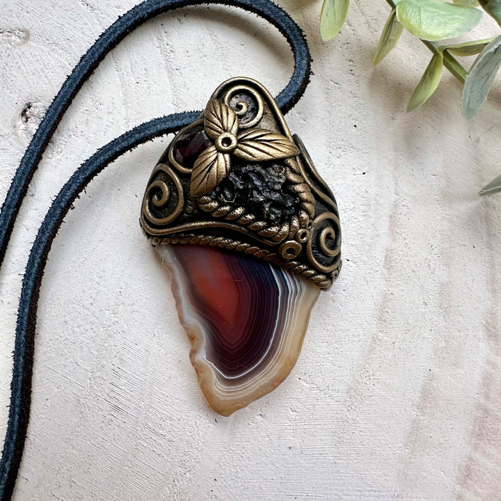 Healing crystal pendant with moldavite and garnet