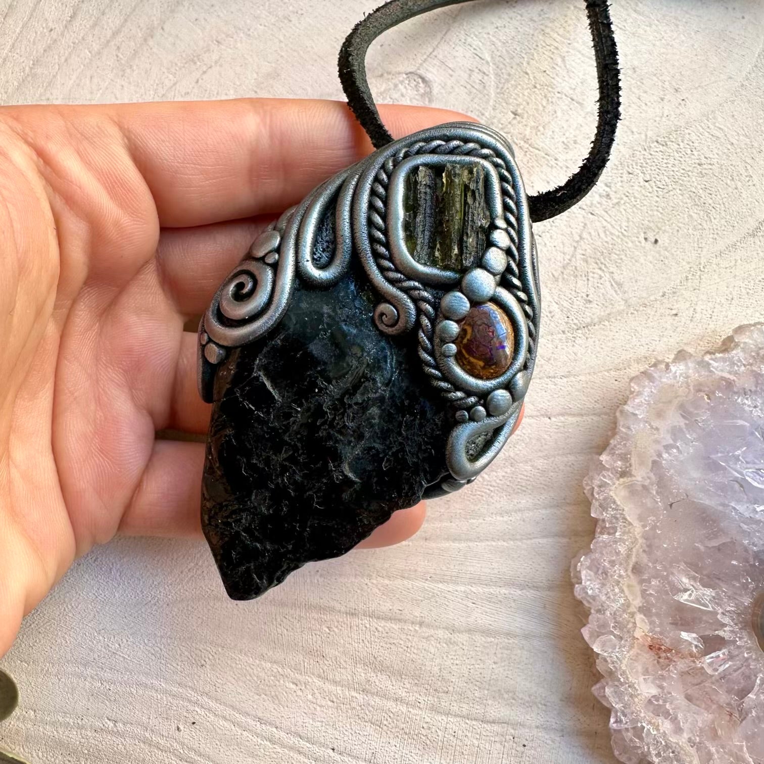 Handmade healing crystal pendant with rare gemstones