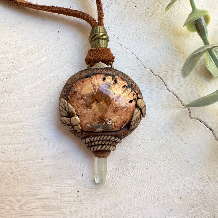 Boho gemstone necklace featuring petrified wood and aquamarine