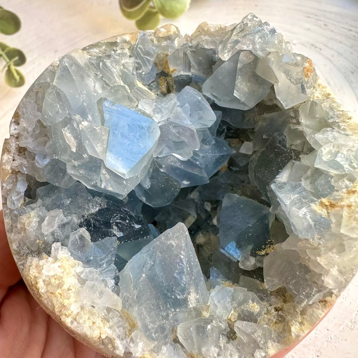 Celestite sphere with natural crystal texture