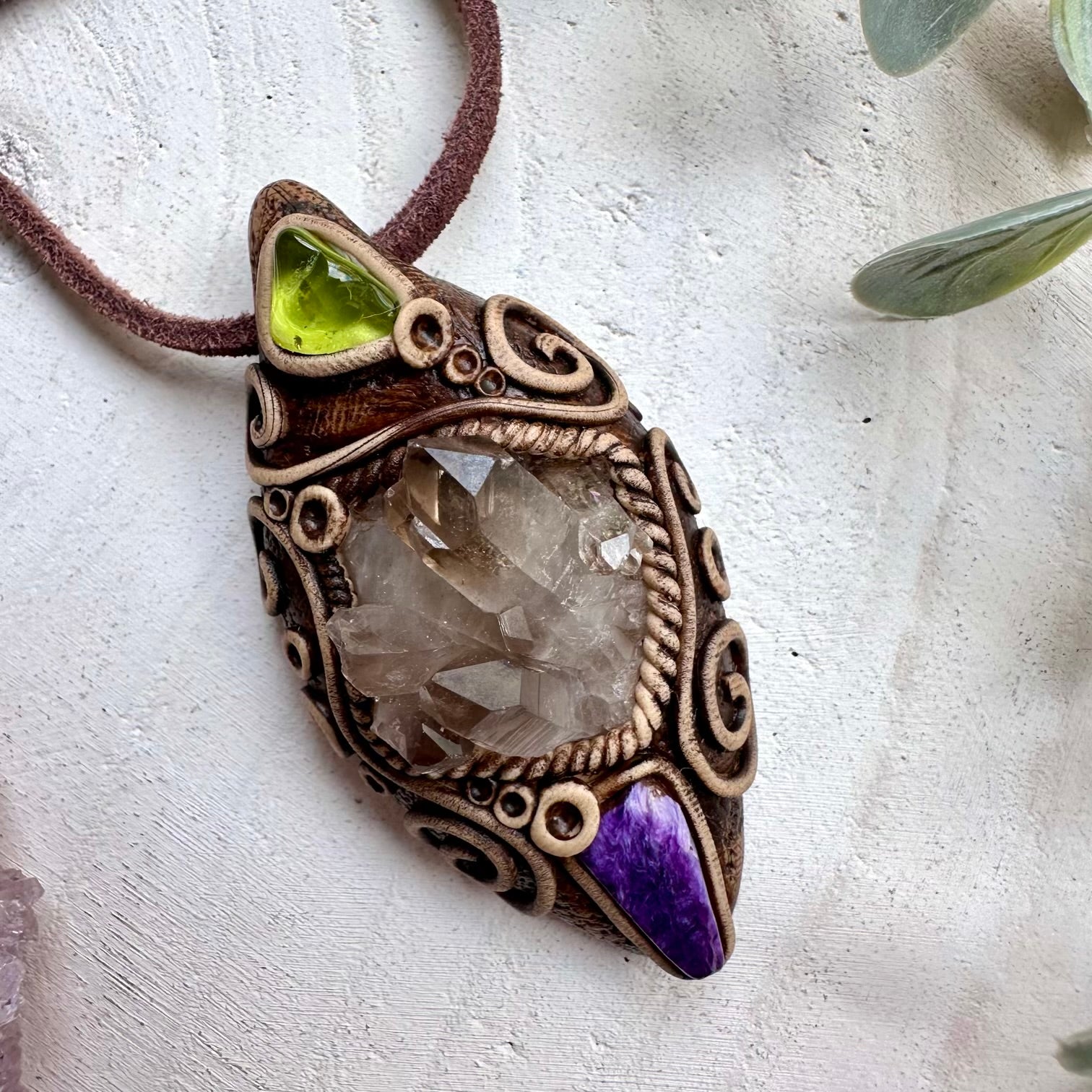 Healing crystal pendant with smoky quartz charoite and peridot