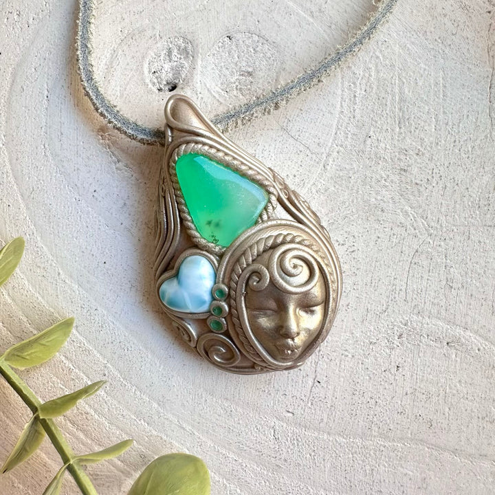 Crystal talisman necklace with chrysoprase larimar heart and emerald